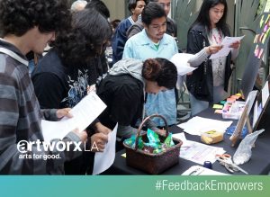 image of students filling out survey at artworxLA #feedbackempowers