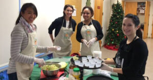 image of people serving food at Second harvest food bank #feedbackempowers