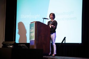 image of Melinda Tuan speaking at the 2018 Gathering