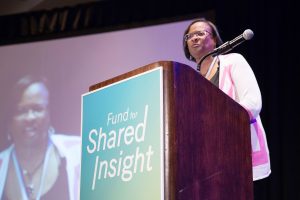 image of Kelley Gulley speaking at 2018 Gathering