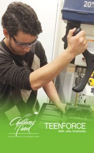 image of Anderson in a robotics class at Pivotal STEM and career-services program