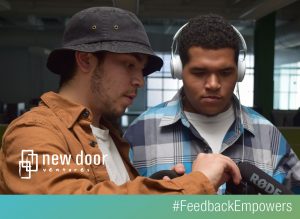 image of Daniel and other teen at New Door Ventures job-training internship program #feedbackempowers