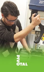 image of Anderson in a robotics class at Pivotal STEM and career-services program