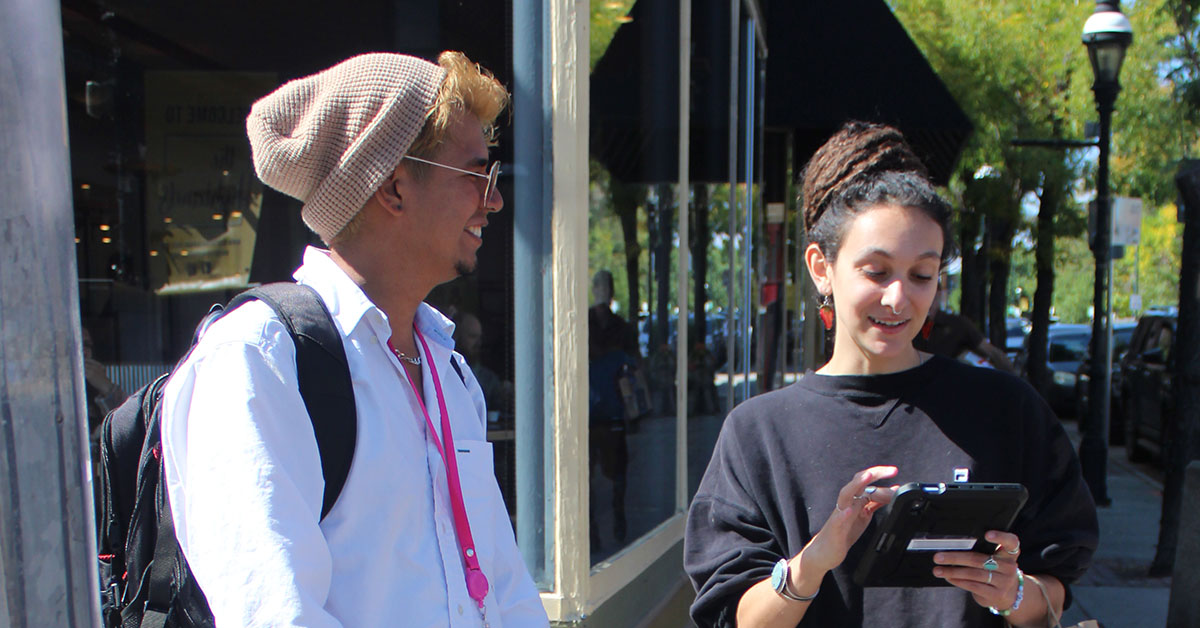 Open Answer mobilizers talk to community members in Denver.