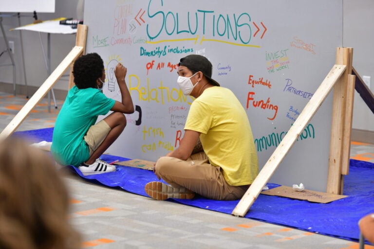 Community members participate in the North Central Plan People’s Assembly, an event at Deaconess Center that exemplifies the Deaconess Foundation’s commitment to community listening.
